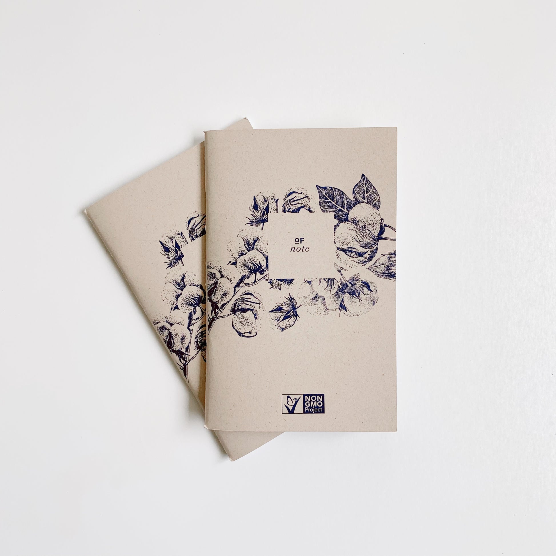 Pair of Non-GMO Project notebooks, displaying front of notebooks